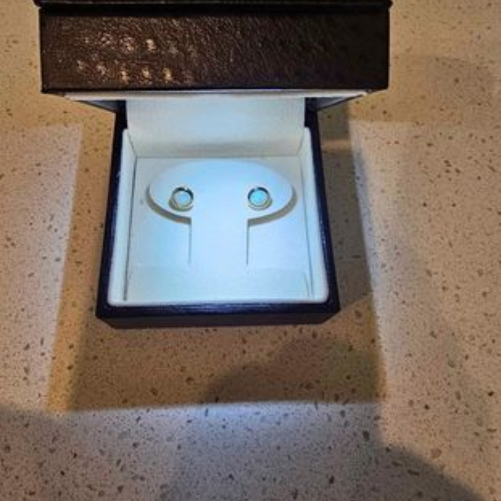 Angara Elegant Opal Stud Earrings The Metal Is 14K Yellow Gold